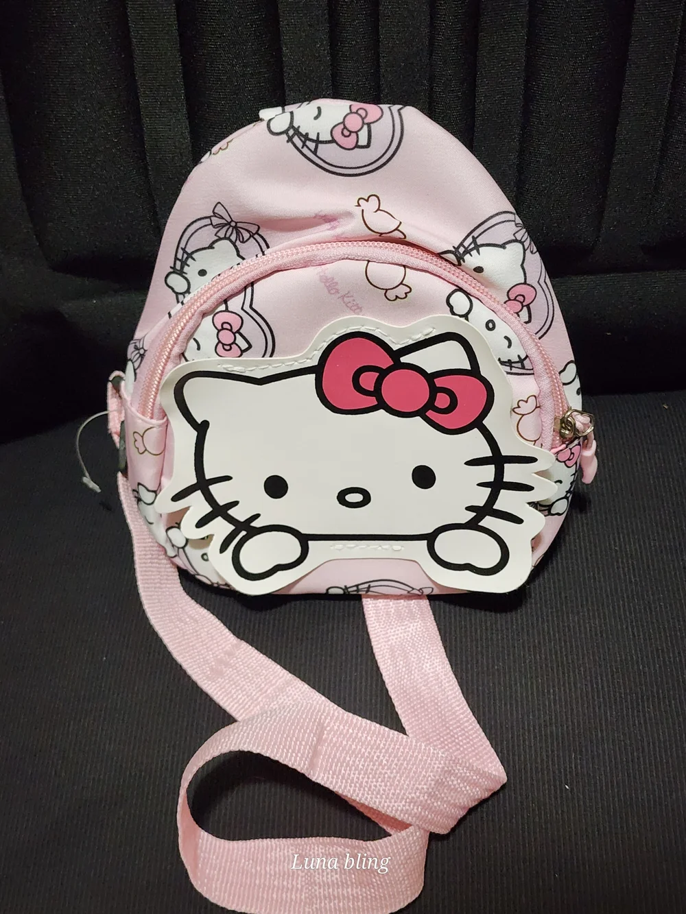 Hello Kitty Light Pink Mini Sling Bag with Bow Accent
